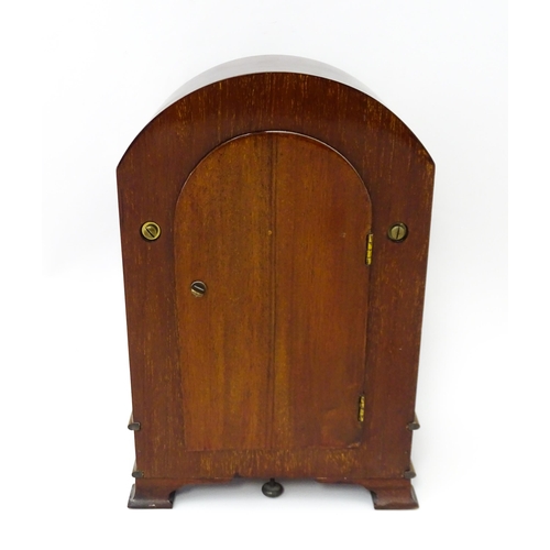 1460 - Bulle - Clock : A French  mahogany cased electric mantel clock by Bulle. Model BC. The case decorate... 