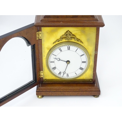 1461 - A 20thC walnut cased mantle clock with inlaid  floral detail and white enamel dial with Roman chapte... 