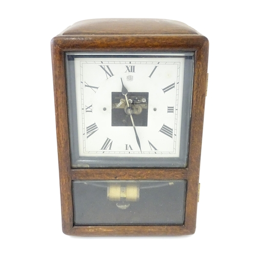 1462 - Bulle : A French Art Deco oak cased electric mantel clock by Bulle. The dial signed Bulle Patent   A... 