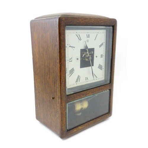 1462 - Bulle : A French Art Deco oak cased electric mantel clock by Bulle. The dial signed Bulle Patent   A... 