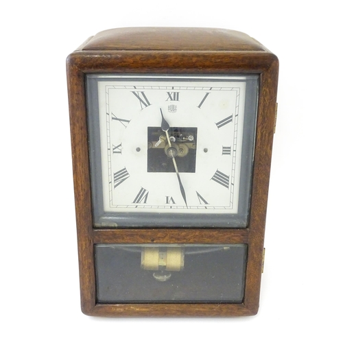 1462 - Bulle : A French Art Deco oak cased electric mantel clock by Bulle. The dial signed Bulle Patent   A... 