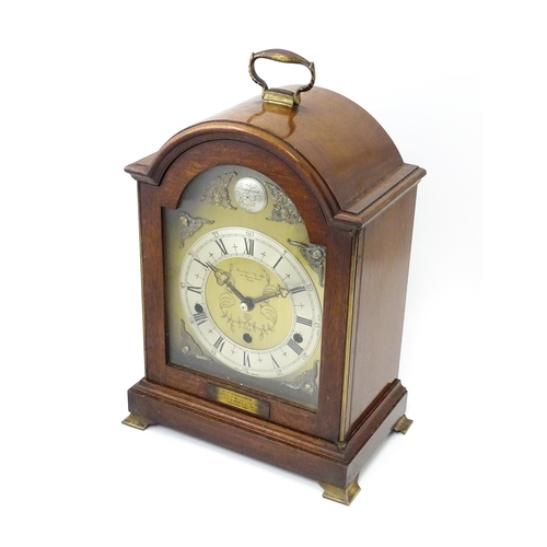 1465 - A 20th century mahogany cased Elliott 8-day chiming mantel clock, retailed by Garrard & Co of London... 