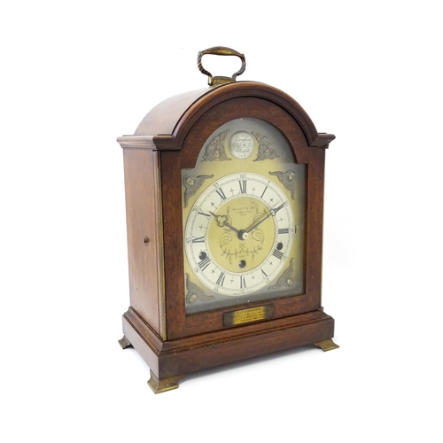 1465 - A 20th century mahogany cased Elliott 8-day chiming mantel clock, retailed by Garrard & Co of London... 