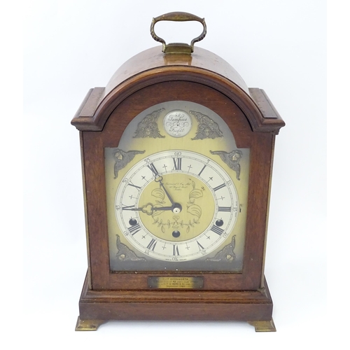 1465 - A 20th century mahogany cased Elliott 8-day chiming mantel clock, retailed by Garrard & Co of London... 