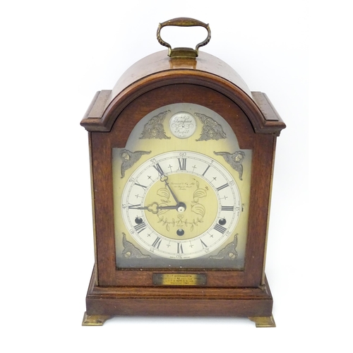 1465 - A 20th century mahogany cased Elliott 8-day chiming mantel clock, retailed by Garrard & Co of London... 