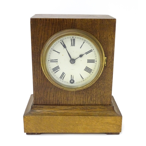 1466 - A 20thC oak cased mantle clock bearing label for Camerer, Kuss & Co.  Approx. 9 1/4