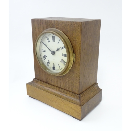 1466 - A 20thC oak cased mantle clock bearing label for Camerer, Kuss & Co.  Approx. 9 1/4