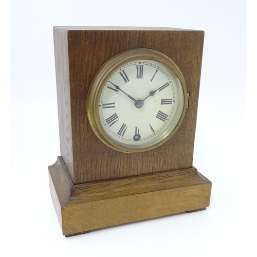 1466 - A 20thC oak cased mantle clock bearing label for Camerer, Kuss & Co.  Approx. 9 1/4