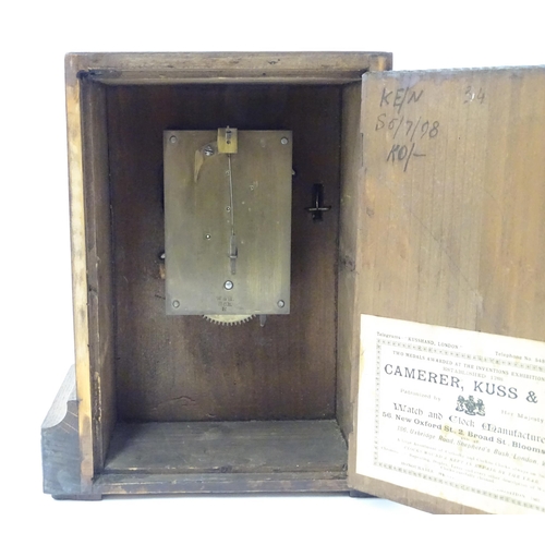 1466 - A 20thC oak cased mantle clock bearing label for Camerer, Kuss & Co.  Approx. 9 1/4