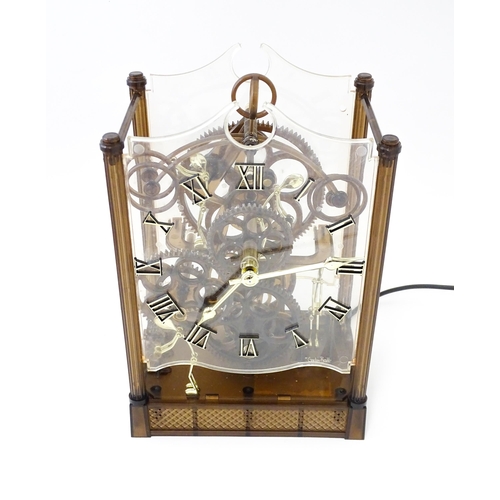 1470 - An Arrow Industries ' Electric Master Motion Clock' known as the  Animated Time Machine' of plastic ... 