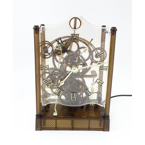 1470 - An Arrow Industries ' Electric Master Motion Clock' known as the  Animated Time Machine' of plastic ... 