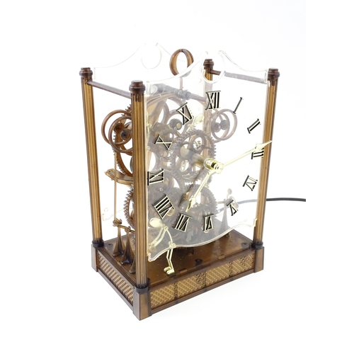 1470 - An Arrow Industries ' Electric Master Motion Clock' known as the  Animated Time Machine' of plastic ... 