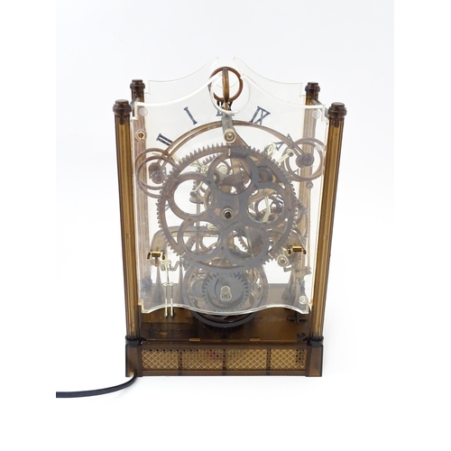 1470 - An Arrow Industries ' Electric Master Motion Clock' known as the  Animated Time Machine' of plastic ... 