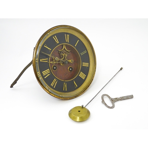 1471 - An 8-day clock movement with Roman chapter ring.  Approx. 7