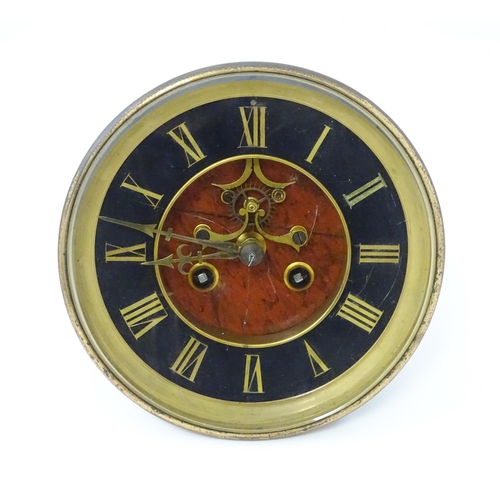 1471 - An 8-day clock movement with Roman chapter ring.  Approx. 7