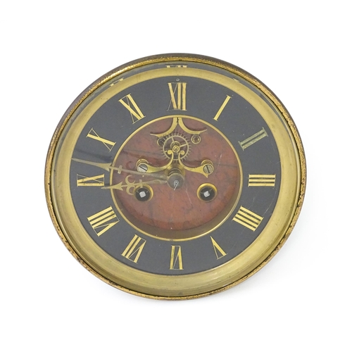 1471 - An 8-day clock movement with Roman chapter ring.  Approx. 7