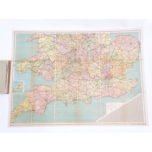 2120 - Maps: A 20thC Map of England and Wales on two folding cloth sheets North Sheet and South Sheet, with... 