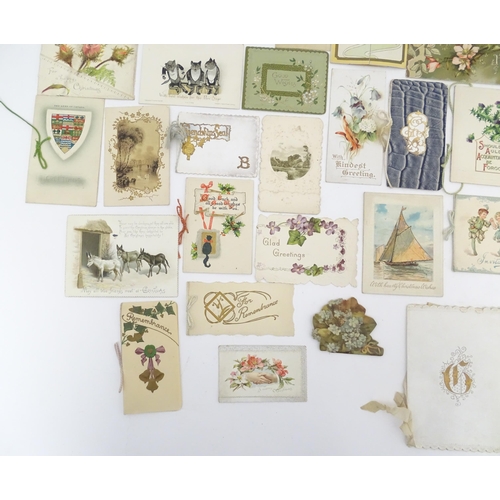 2132 - A quantity of early 20thC greetings cards, Christmas cards, Birthday wishes, postcards, etc. Subject... 