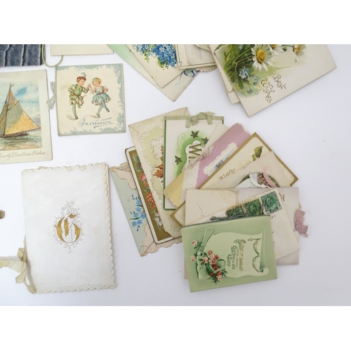 2132 - A quantity of early 20thC greetings cards, Christmas cards, Birthday wishes, postcards, etc. Subject... 