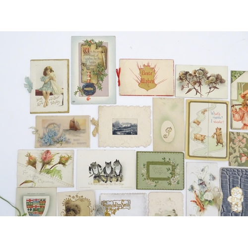 2132 - A quantity of early 20thC greetings cards, Christmas cards, Birthday wishes, postcards, etc. Subject... 