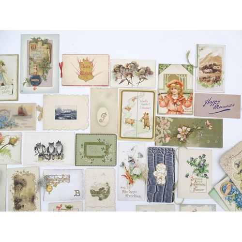 2132 - A quantity of early 20thC greetings cards, Christmas cards, Birthday wishes, postcards, etc. Subject... 