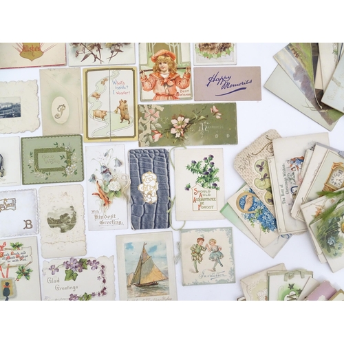 2132 - A quantity of early 20thC greetings cards, Christmas cards, Birthday wishes, postcards, etc. Subject... 