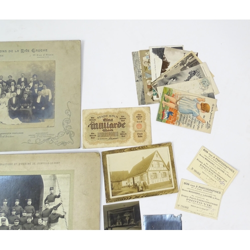 2141 - A quantity of assorted early 20thC French photographs to include studio portraits of Emilienne d'Ale... 