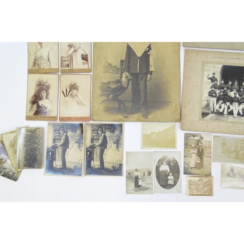 2141 - A quantity of assorted early 20thC French photographs to include studio portraits of Emilienne d'Ale... 