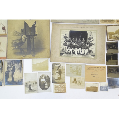 2141 - A quantity of assorted early 20thC French photographs to include studio portraits of Emilienne d'Ale... 