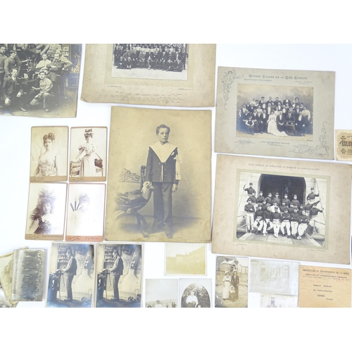 2141 - A quantity of assorted early 20thC French photographs to include studio portraits of Emilienne d'Ale... 