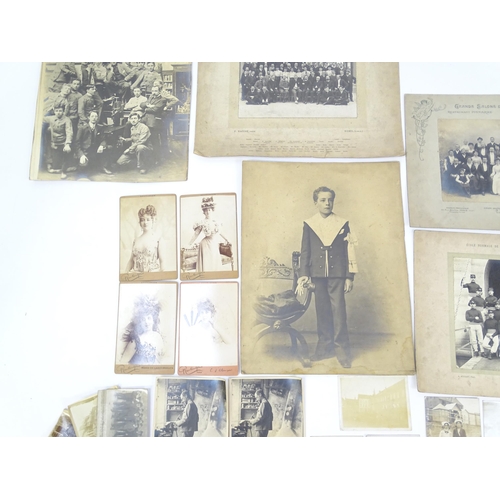 2141 - A quantity of assorted early 20thC French photographs to include studio portraits of Emilienne d'Ale... 