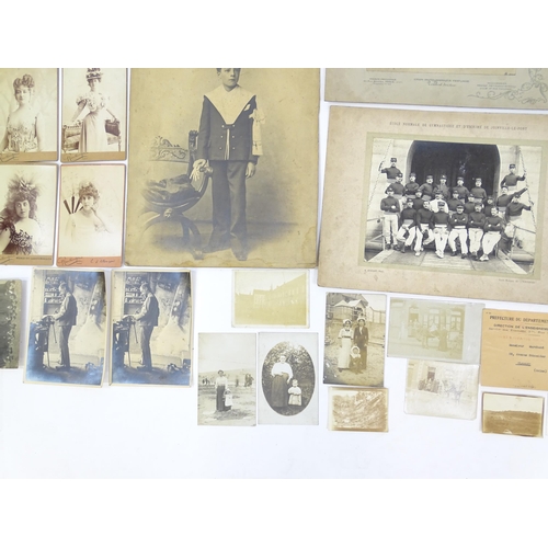 2141 - A quantity of assorted early 20thC French photographs to include studio portraits of Emilienne d'Ale... 