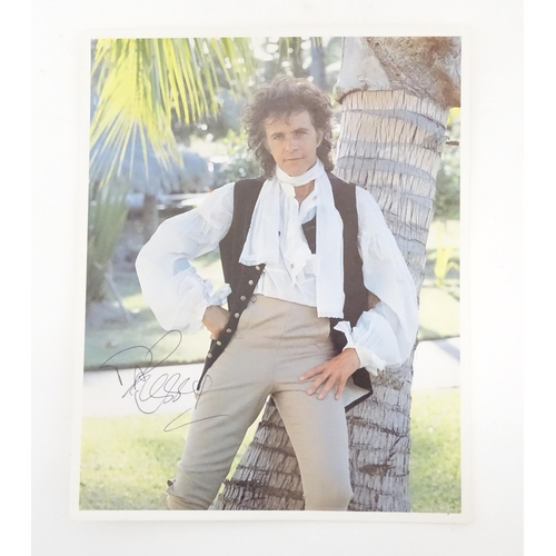 2143 - A quantity of signed photographs with autograph signatures to include Shirley Bassey, Nils Lofgren, ... 