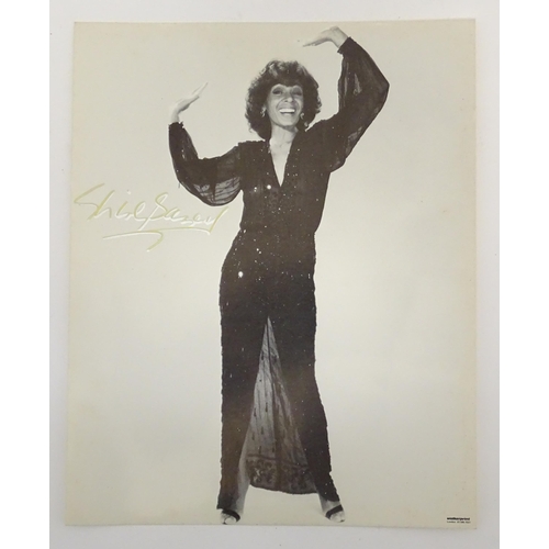 2143 - A quantity of signed photographs with autograph signatures to include Shirley Bassey, Nils Lofgren, ... 