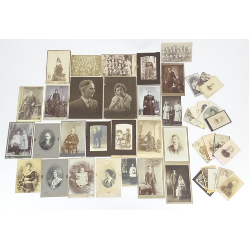 2144 - A quantity of assorted 19thC and later studio photograph cards / carte de visite type photographs to... 