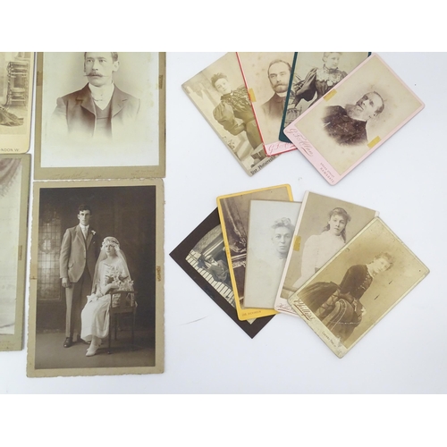 2144 - A quantity of assorted 19thC and later studio photograph cards / carte de visite type photographs to... 