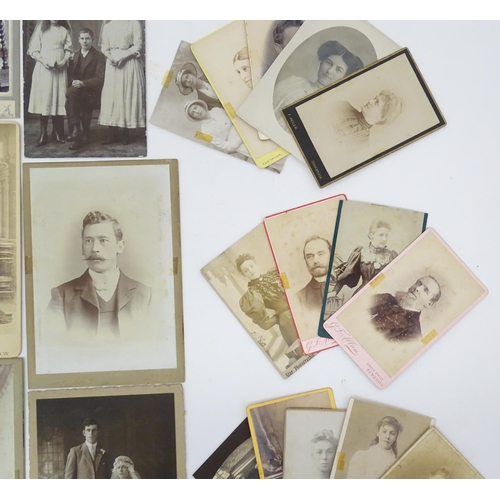 2144 - A quantity of assorted 19thC and later studio photograph cards / carte de visite type photographs to... 