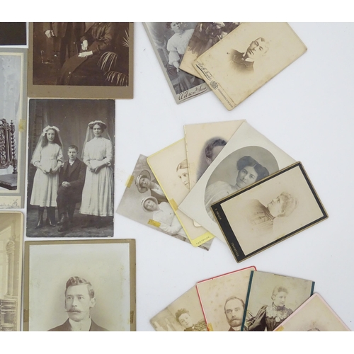 2144 - A quantity of assorted 19thC and later studio photograph cards / carte de visite type photographs to... 