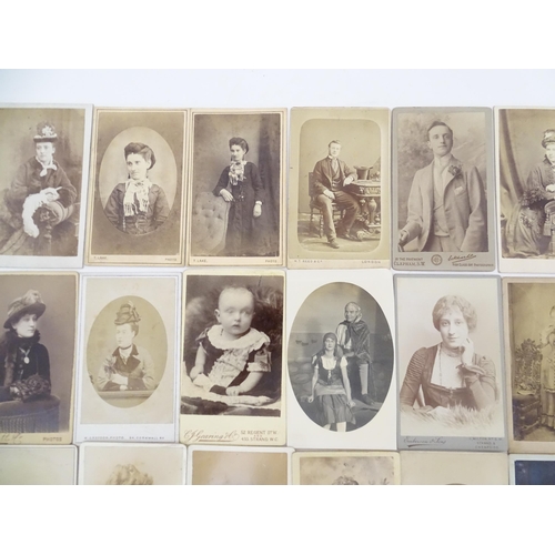 2145 - A quantity of assorted 19thC carte de visite photographs to include men, women and children. Various... 