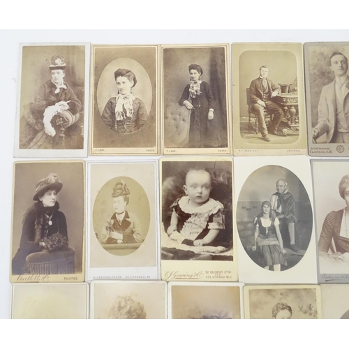 2145 - A quantity of assorted 19thC carte de visite photographs to include men, women and children. Various... 