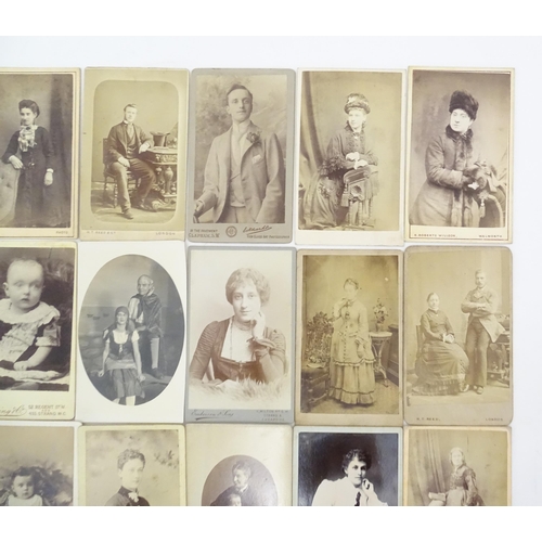 2145 - A quantity of assorted 19thC carte de visite photographs to include men, women and children. Various... 