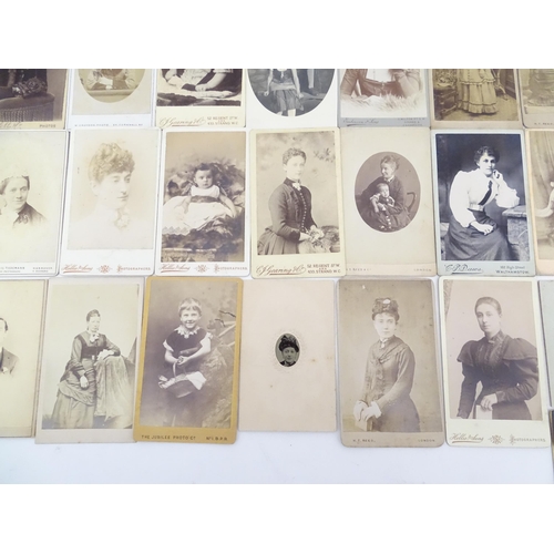 2145 - A quantity of assorted 19thC carte de visite photographs to include men, women and children. Various... 