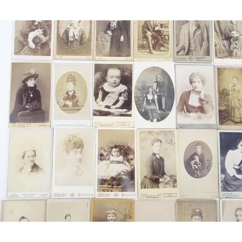 2145 - A quantity of assorted 19thC carte de visite photographs to include men, women and children. Various... 