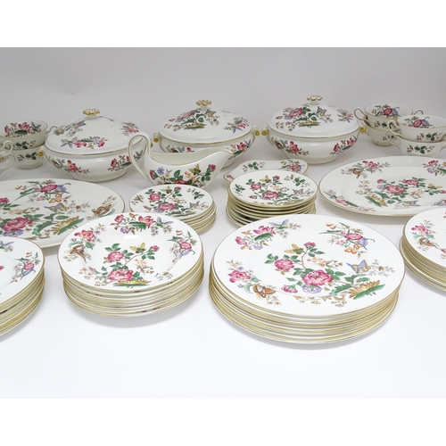 170A - A quantity of Wedgwood dinner wares in the Charnwood pattern to include plates, twin handles soup bo... 