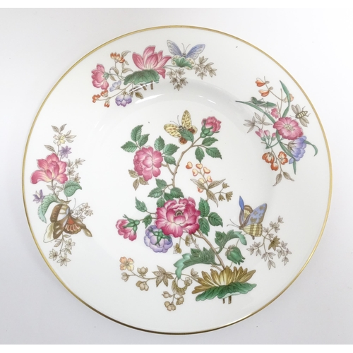 170A - A quantity of Wedgwood dinner wares in the Charnwood pattern to include plates, twin handles soup bo... 