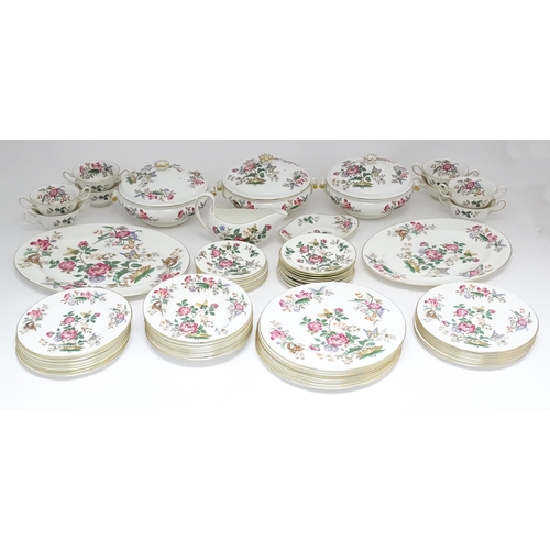 170A - A quantity of Wedgwood dinner wares in the Charnwood pattern to include plates, twin handles soup bo... 