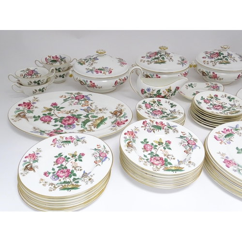 170A - A quantity of Wedgwood dinner wares in the Charnwood pattern to include plates, twin handles soup bo... 