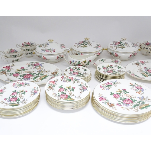 170A - A quantity of Wedgwood dinner wares in the Charnwood pattern to include plates, twin handles soup bo... 