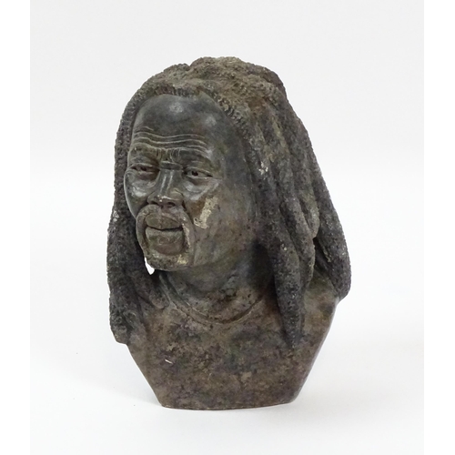 1150 - Ethnographic / Native / Tribal : An African carved soapstone bust modelled as a man with dreadlocks.... 