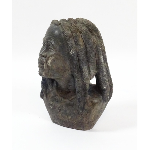 1150 - Ethnographic / Native / Tribal : An African carved soapstone bust modelled as a man with dreadlocks.... 